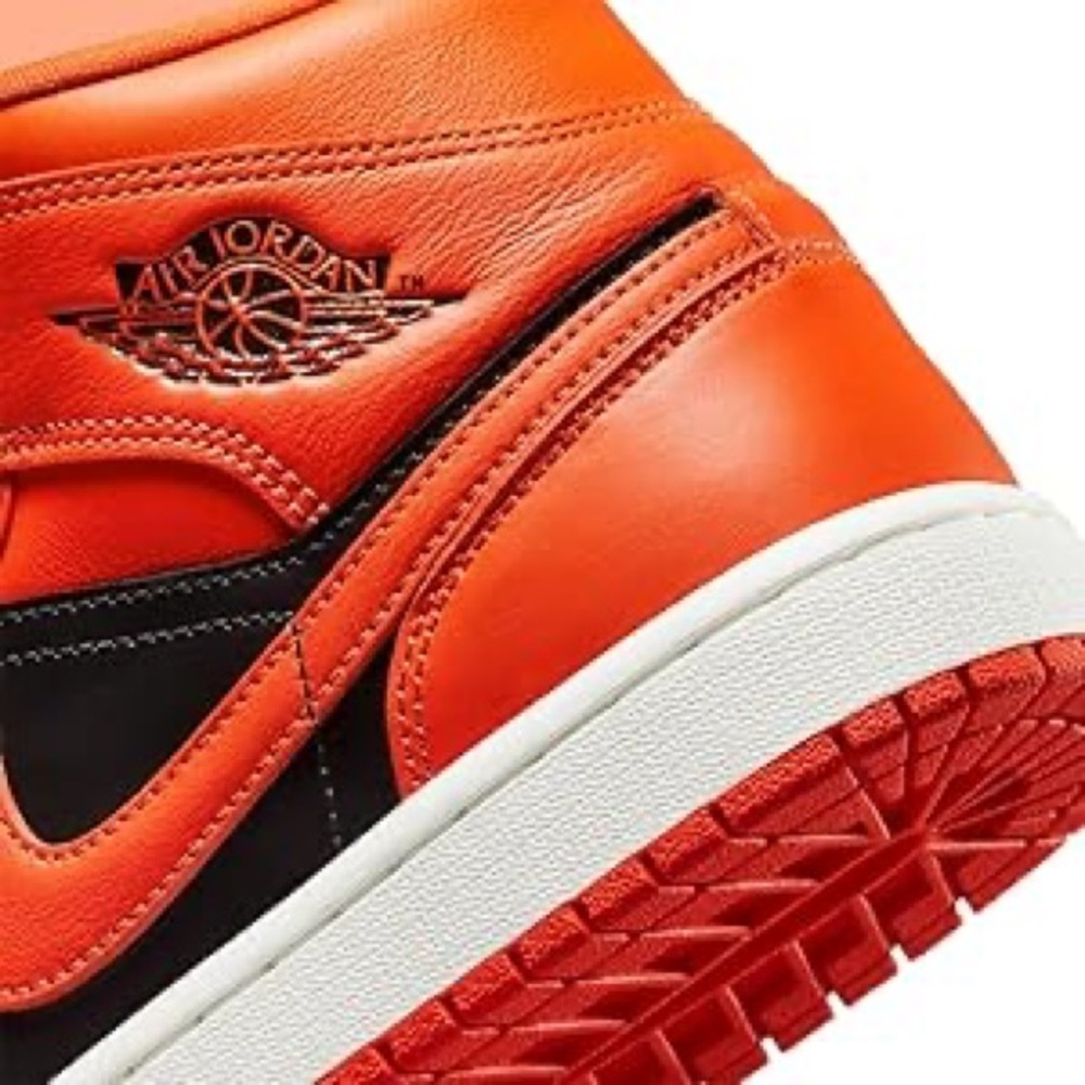 Jordan Orange and Black High-Top Sneakers
